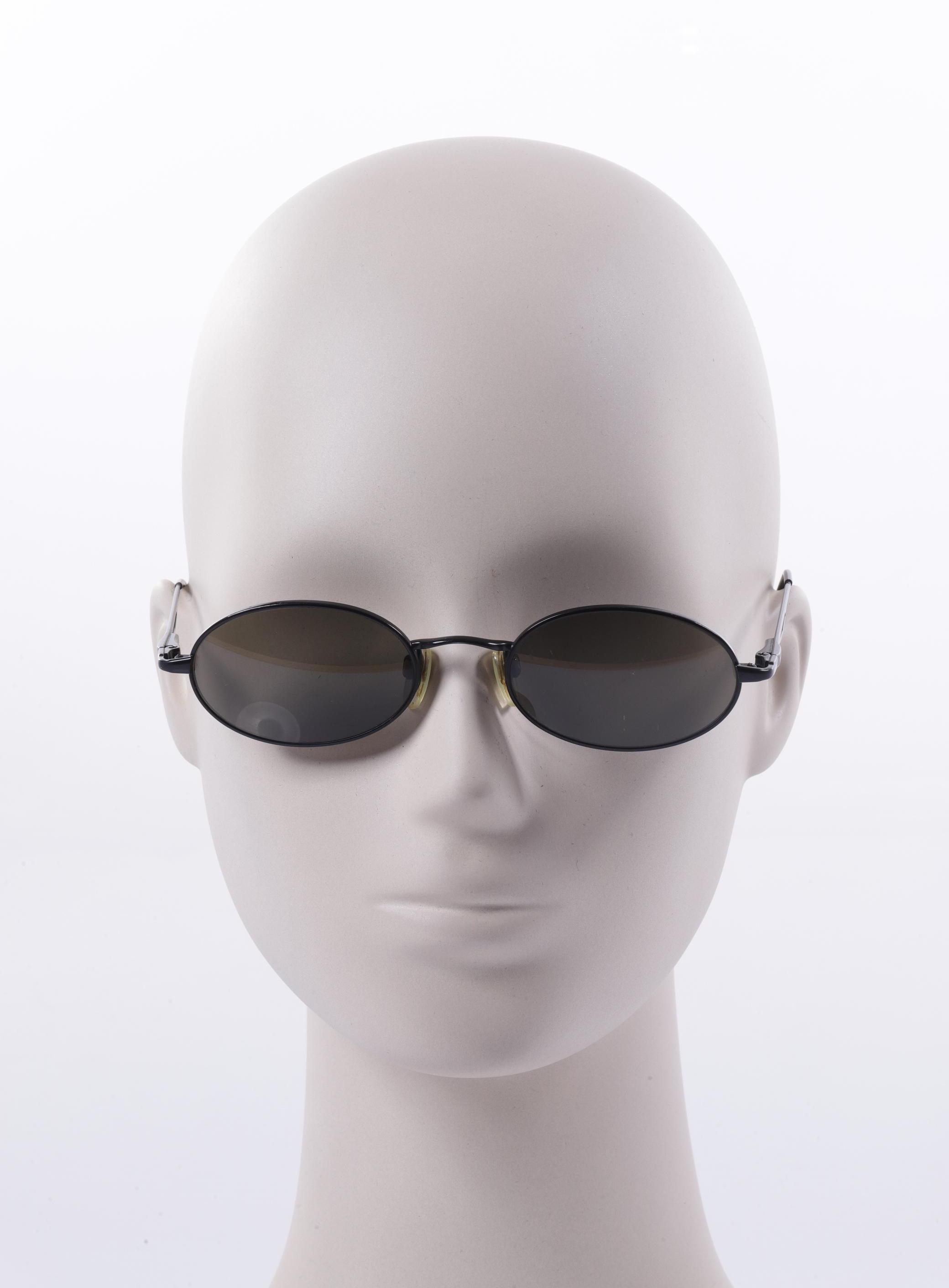 

Emporio Armani Damen Sonnenbrille, schwarz, Gr.