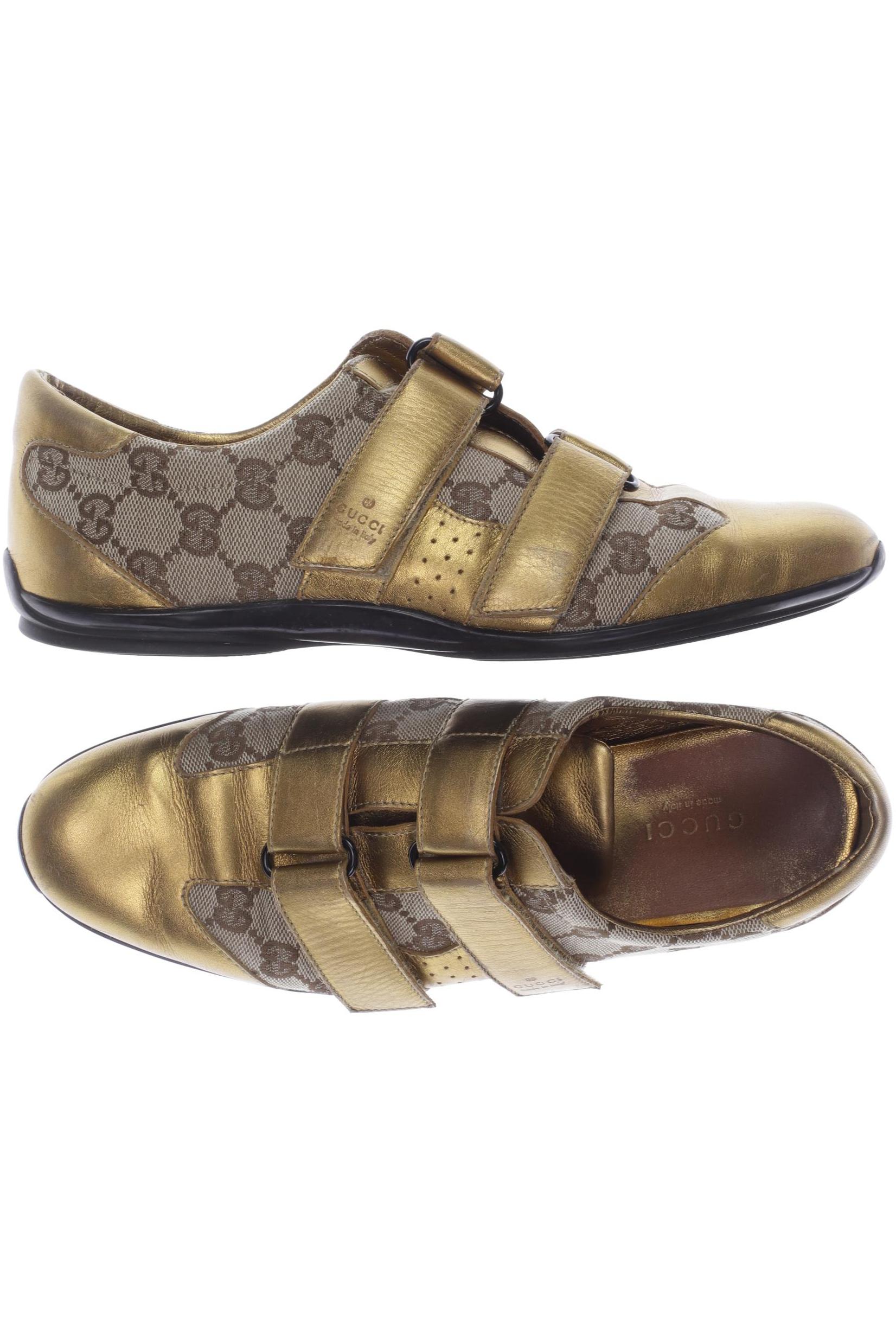 

Gucci Damen Sneakers, gold