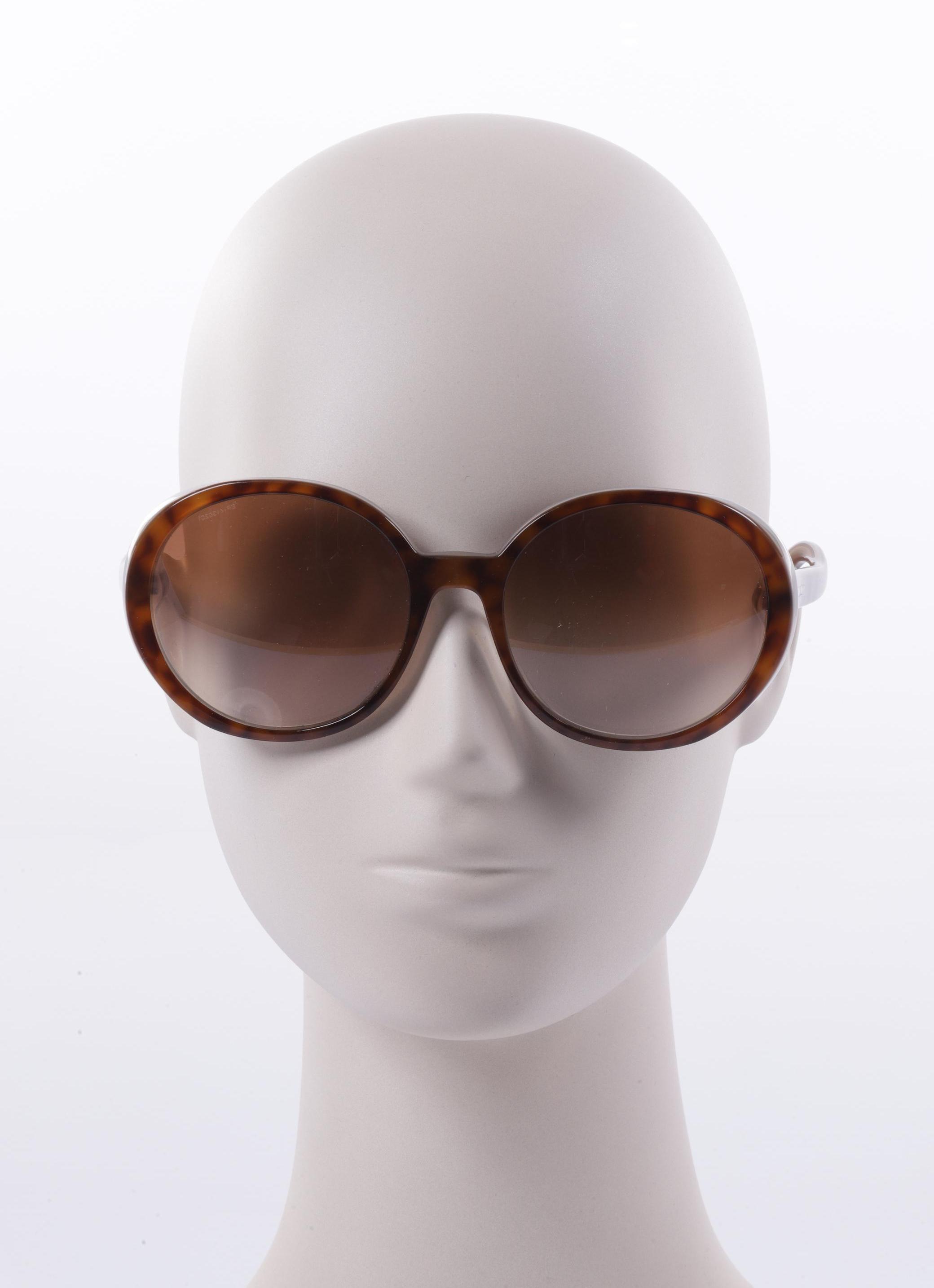 

Miu Miu Damen Sonnenbrille, braun, Gr.