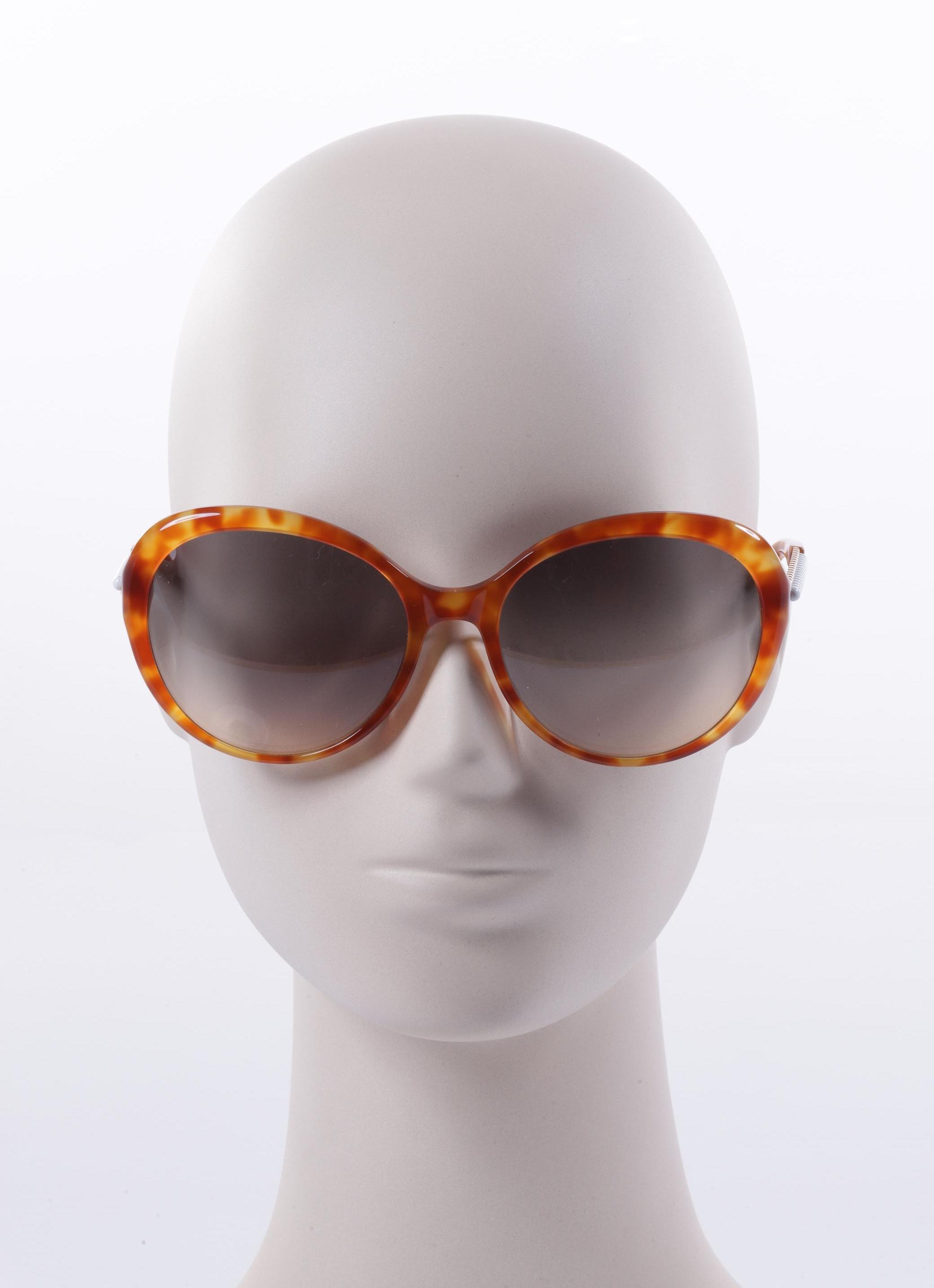 

Moschino Damen Sonnenbrille, braun, Gr.
